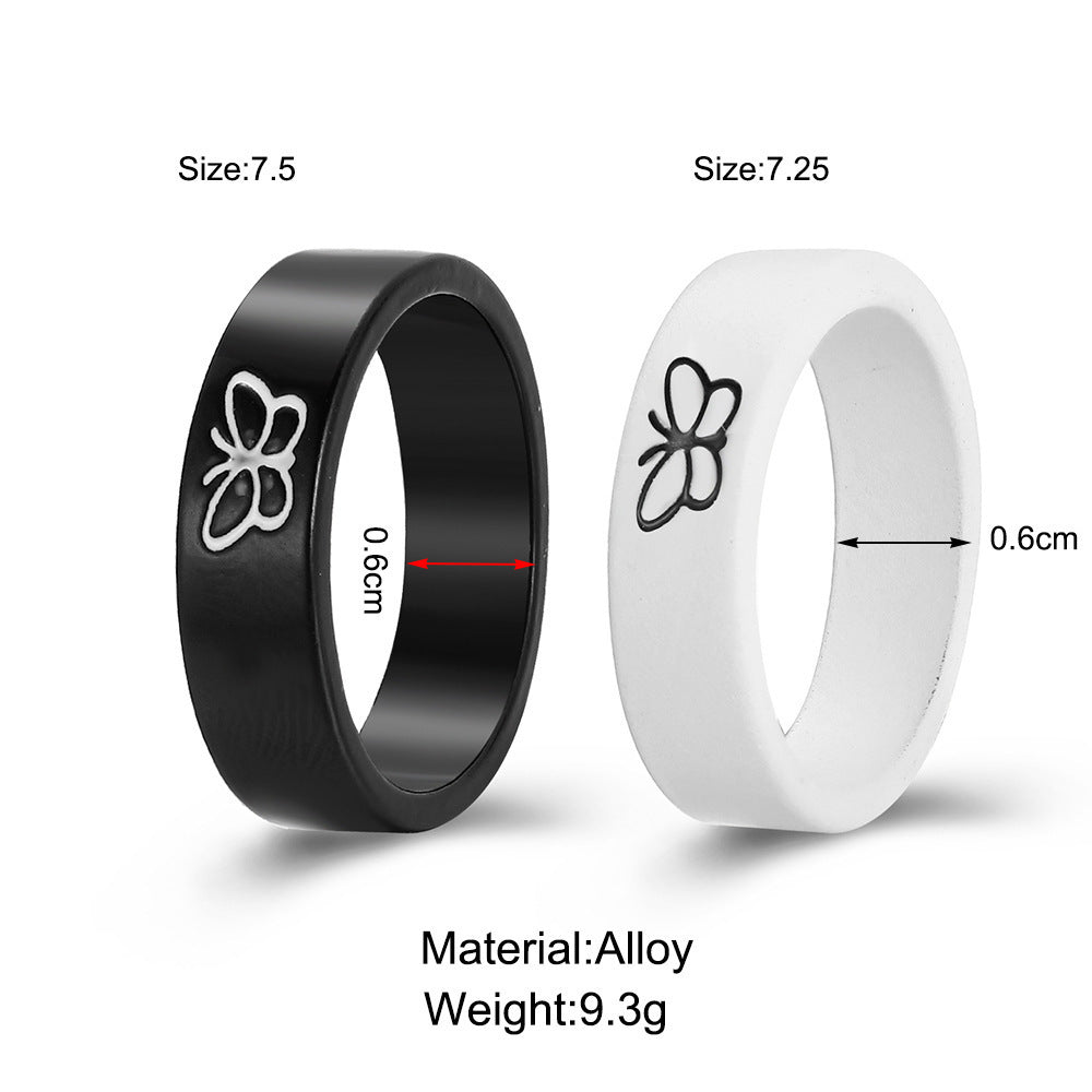 Juego de anillos de resina tallada de mariposa minimalista en blanco y negro para mujer
