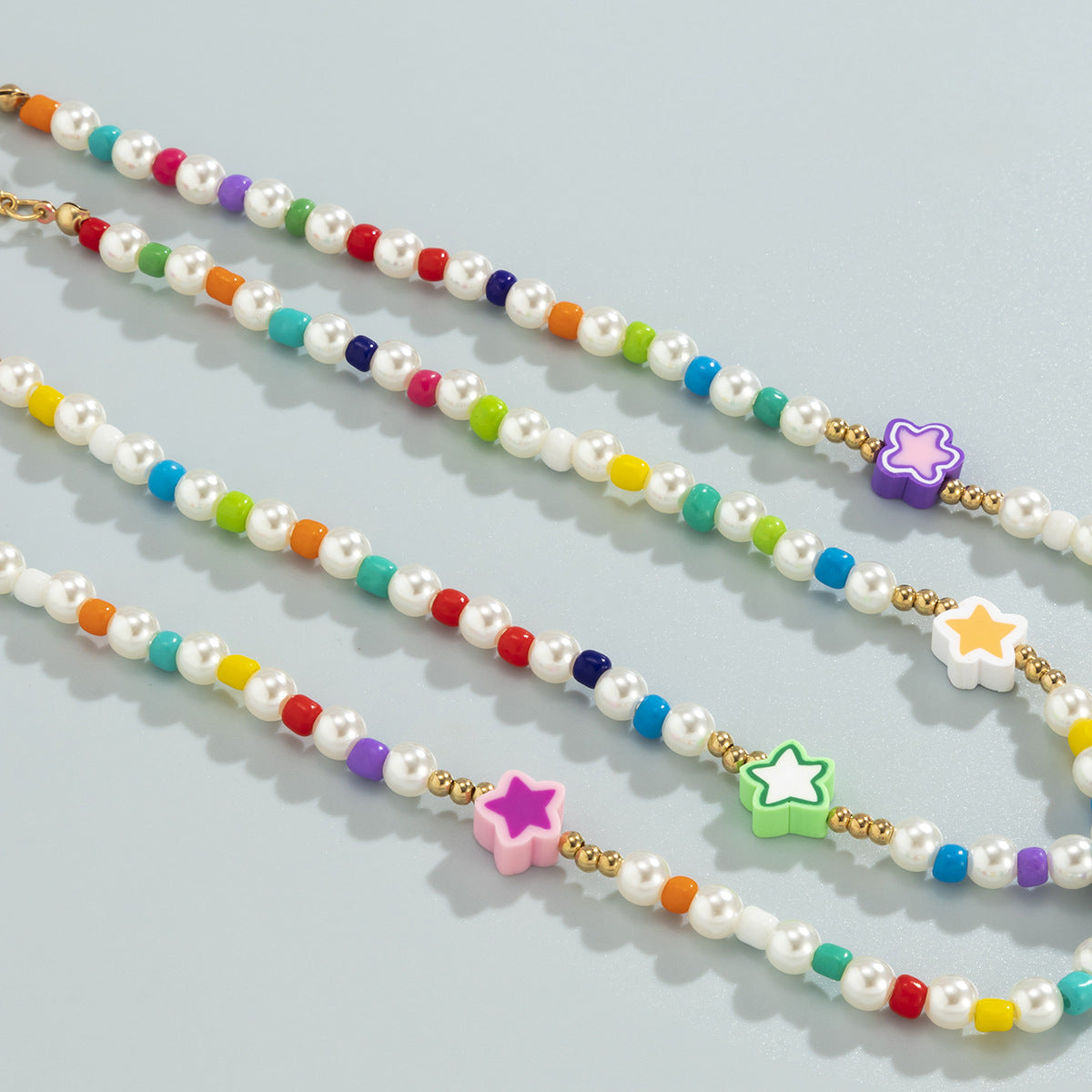 Collana Pendente a Stella Bohemien Geometrica da Donna con Perline in Resina e Dettagli Nappe su Catena a Sfere
