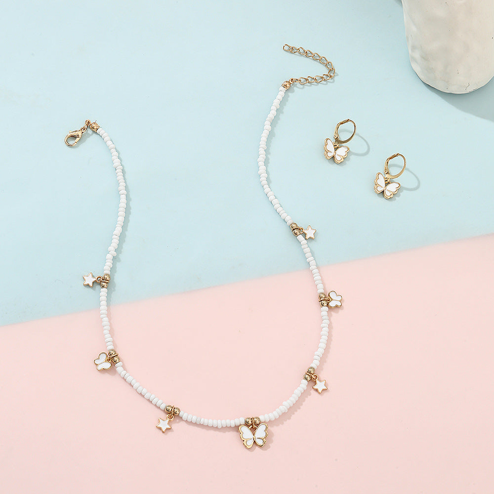 Set de collar con colgante minimalista de mariposa y estrella para niñas, joyería de aleación con cadena de perlas