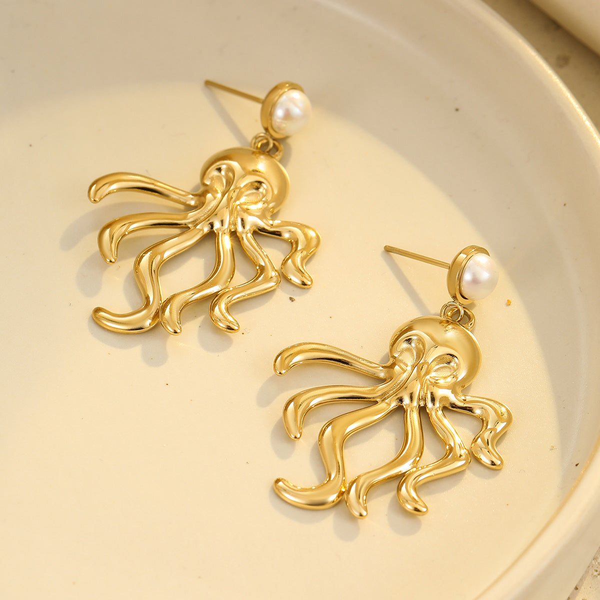 Pendientes de acero inoxidable de moda con forma de estrella de mar y coral con acabado chapado para mujer