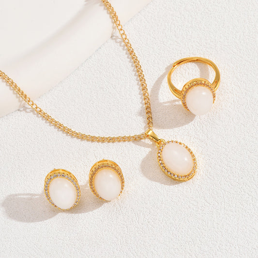 Minimalist Fashion Women's Copper Necklace Set with Zircon Inlay Heart-Shaped Pendant and Matching Ring and Earrings