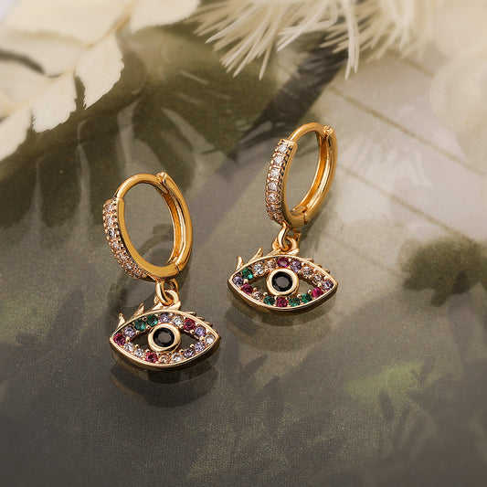 Orecchini a perno geometrici minimalisti color oro e rame con zirconi colorati a forma di occhio di Hamsa per donna
