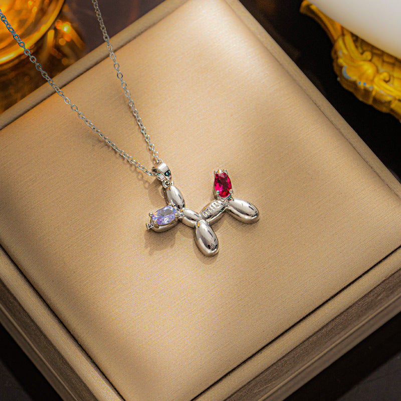 Collana con ciondolo a forma di cane palloncino minimalista in acciaio al titanio con finitura galvanizzata da donna