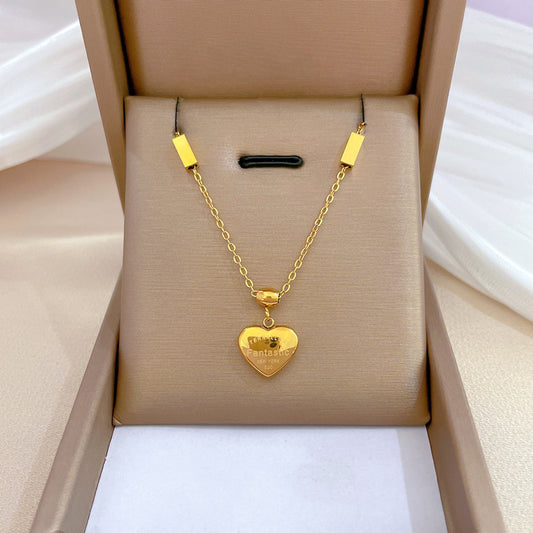 Collana Minimalista con Ciondolo a Cuore in Acciaio al Titanio da Donna, Catena Clavicola Placcata Oro con Motivo Floreale