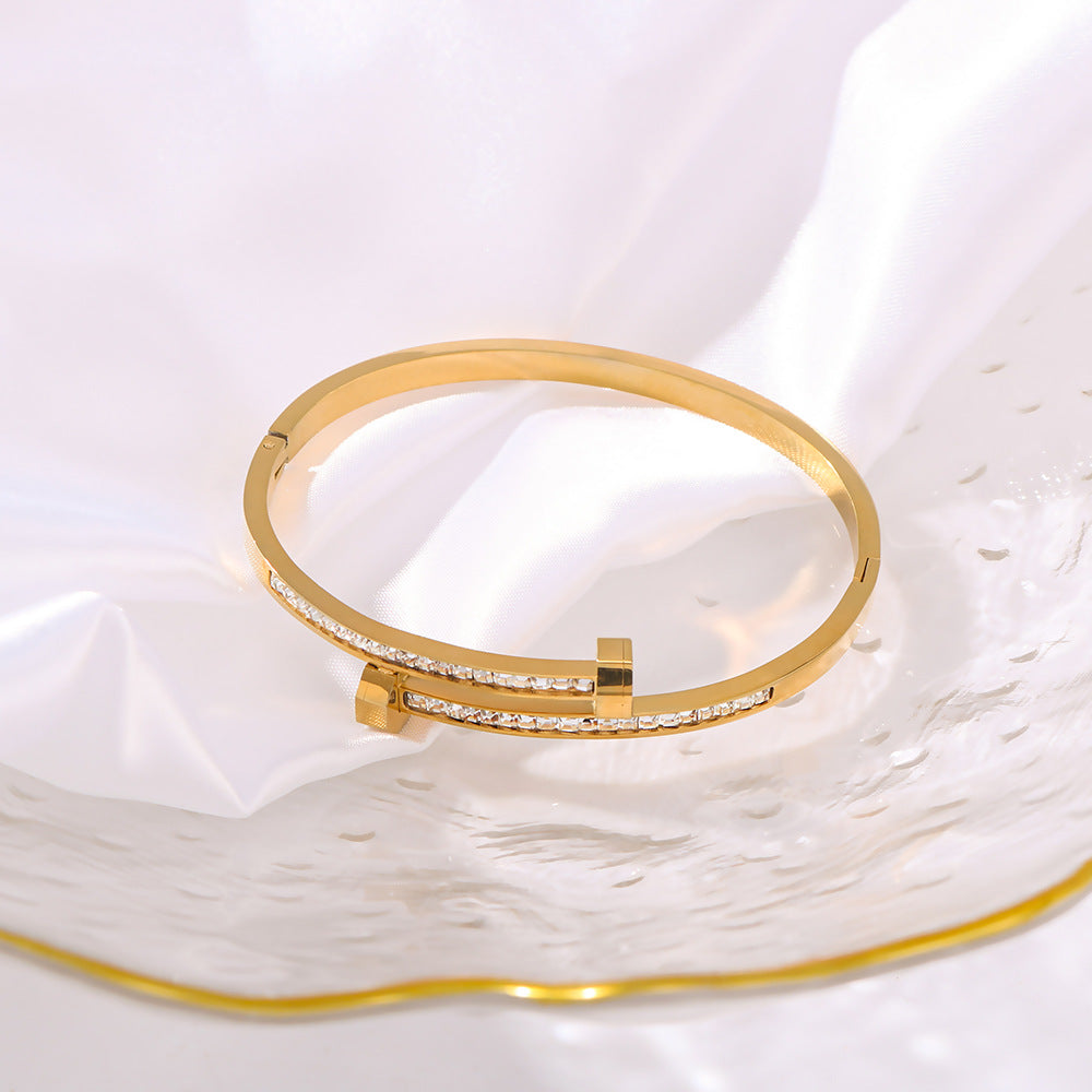 Asymmetrical Titanium Steel Bracelet with 18K Gold Plating and Zircon Inlay, Open-Disc Design for Women
