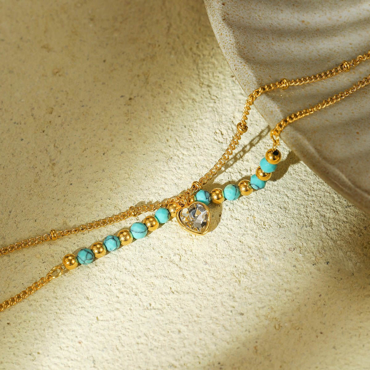 Elegante Bracciale da Donna a Cuore con Pietra Naturale Blu e Zirconi su Catena in Acciaio al Titanio
