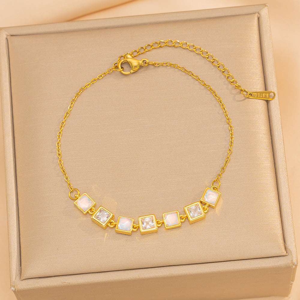 Bracciale da donna di lusso geometrico quadrato con occhio di gatto e zirconi, in acciaio al titanio con intarsi di strass e placcatura anti-ossidazione