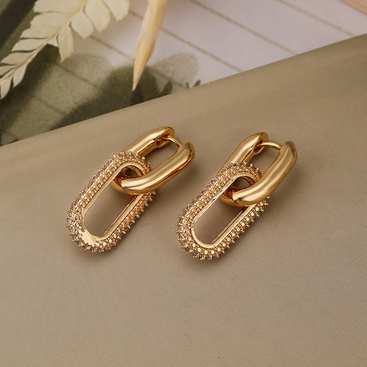 Orecchini minimalisti geometrici in rame placcato oro vero con intarsio in zirconi per donna