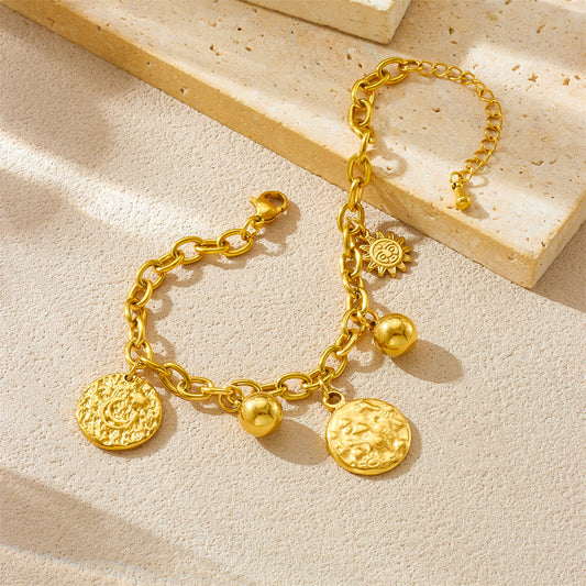 Pulsera vintage con dije irregular de sol y luna con cadena de acero inoxidable y acabado chapado