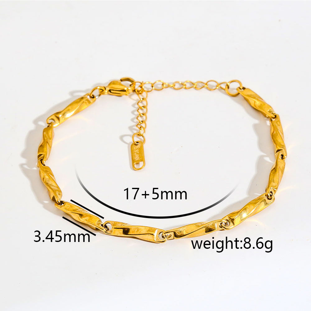 Cavigliera minimalista da donna in acciaio inossidabile placcato oro con piccole perline e ciondolo rotante