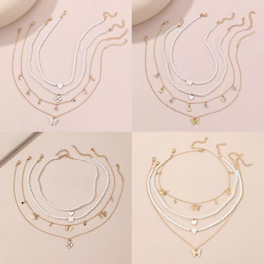 Bonito collar con dije de aleación esmaltado en forma de corazón para niños con cadena de eslabones torcidos