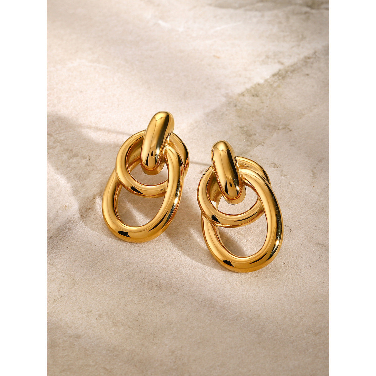Vintage Minimalist 18K Gold Plated Stainless Steel Hollow Twisted Hoop Earrings for Women