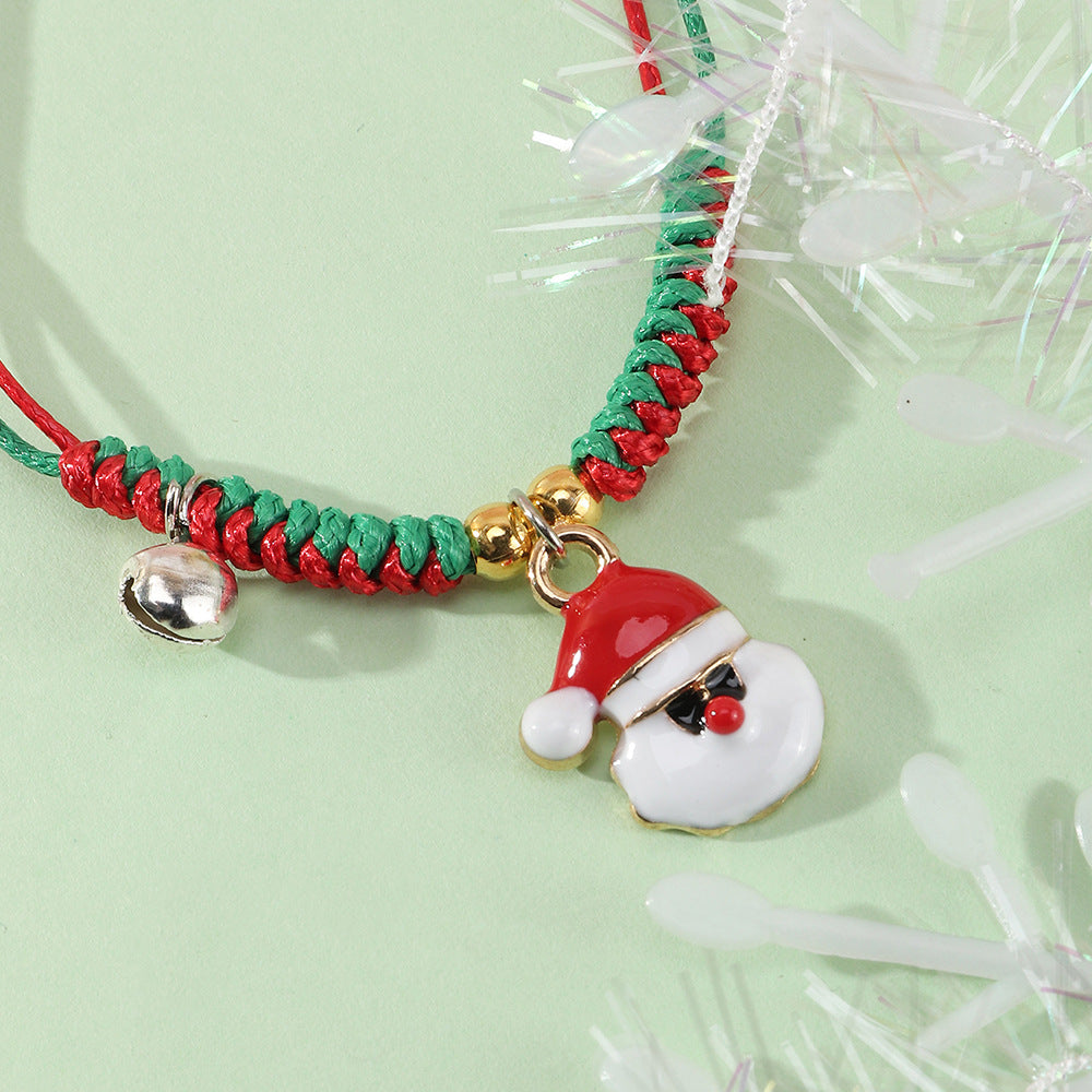 Bracciale Natalizio Artigianale Regolabile da Bambina con Ciondolo Babbo Natale in Cordino di Poliestere Rosso e Verde, Gioiello Festivo
