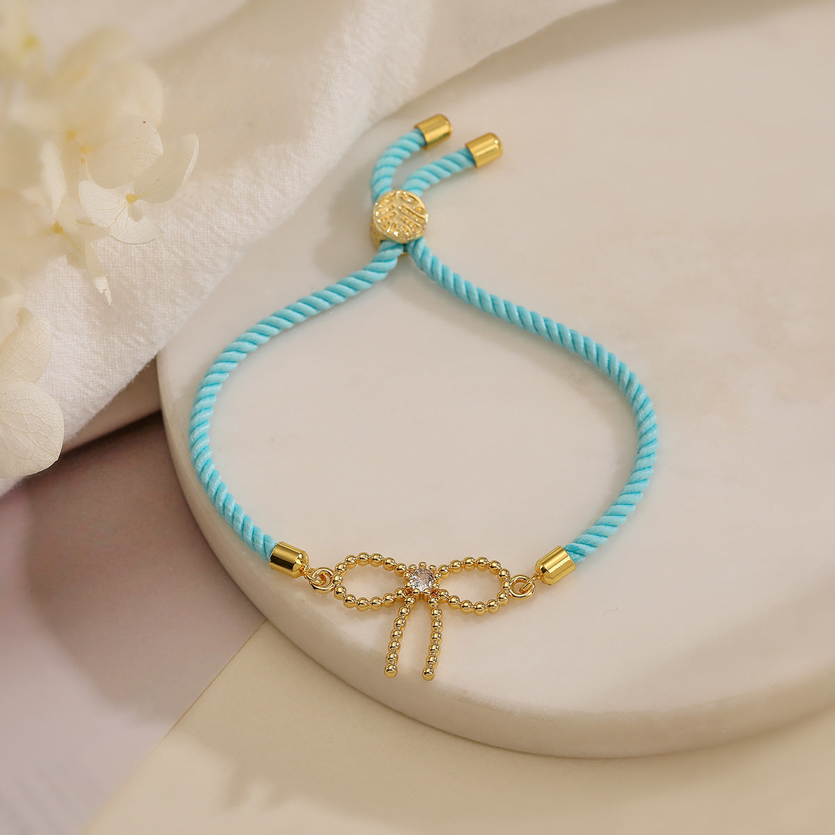Sweet Bowknot-Shaped Hand Chain for Women with Copper Base Plated in 18K Gold and Micro-Paved Zirconia, Geometric Design Fashion Accessory