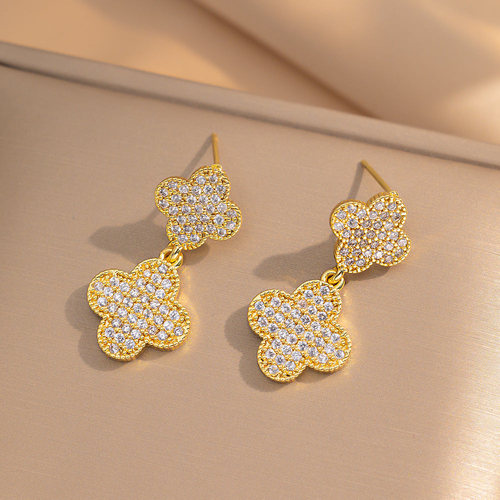 Orecchini a perno Saturno minimalisti color oro in ottone con zirconi per donna