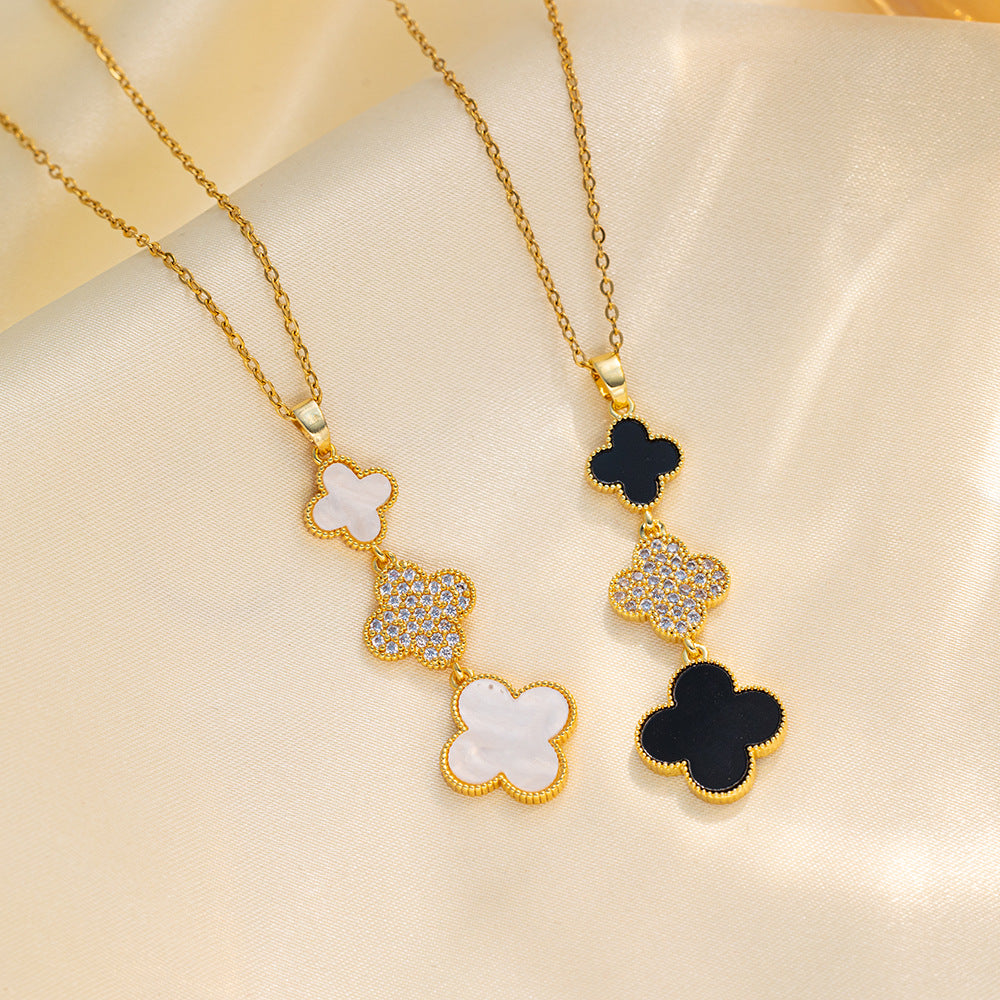 Collar minimalista con colgante de trébol de cuatro hojas en acero de titanio con chapado en oro en cadena O para mujer