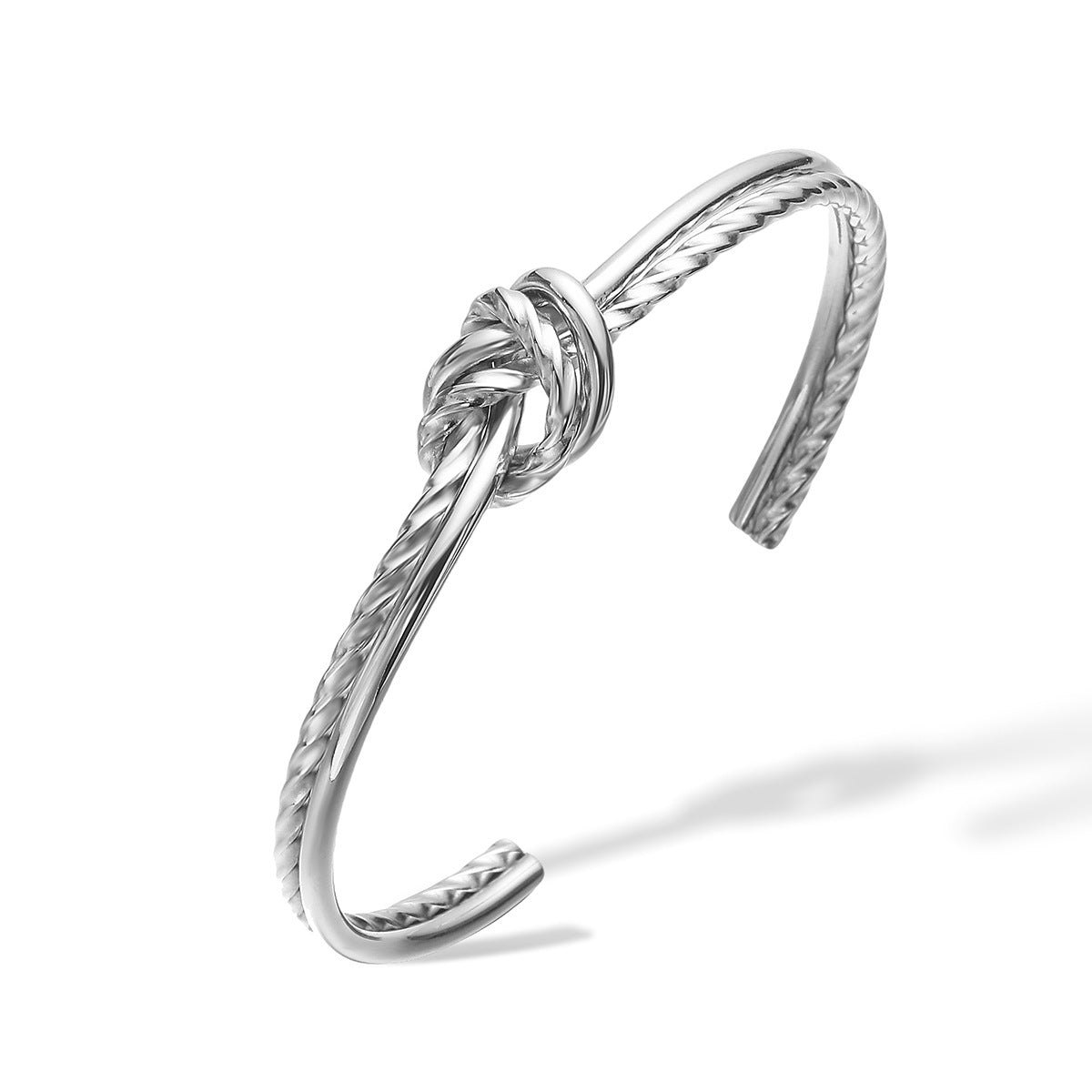Bracciale minimalista da donna in acciaio inossidabile con apertura a nodo geometrico e finitura placcata