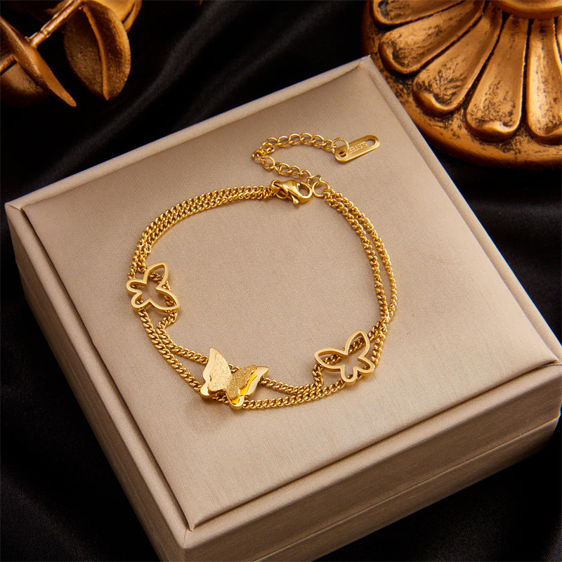 Bracciale Minimalista in Acciaio al Titanio a Strati con Ciondolo a Cuore, Cerchio, Sorriso, Farfalla e Occhio