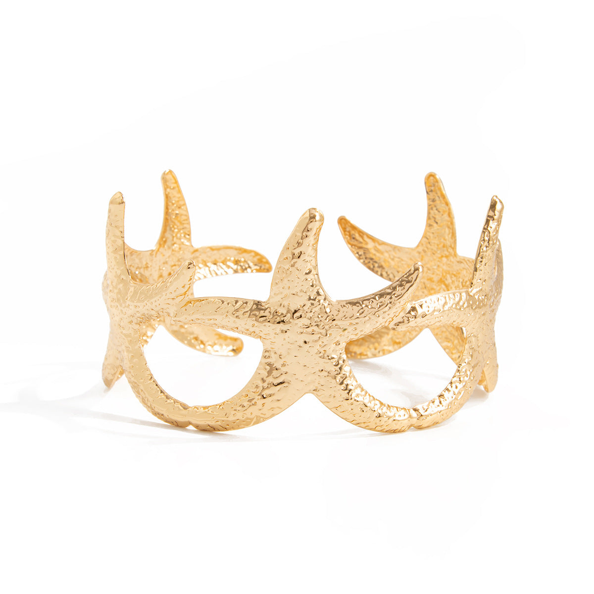 Pulsera rígida abierta con forma de estrella estilo vacaciones en metal chapado con superficie texturizada y diseño inspirado en el océano