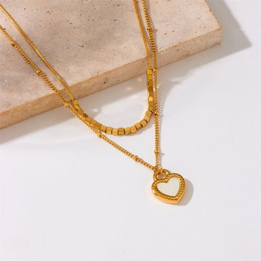 Collana Minimalista a Doppio Strato in Acciaio al Titanio Placcato Oro con Ciondolo a Cuore Bianco e Nero