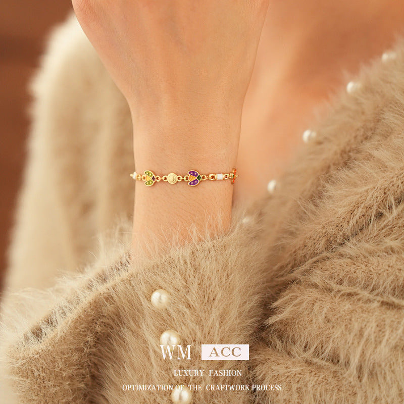 Bracciale vintage da donna con motivo floreale geometrico in lega e smalto, elegante gioiello di lusso
