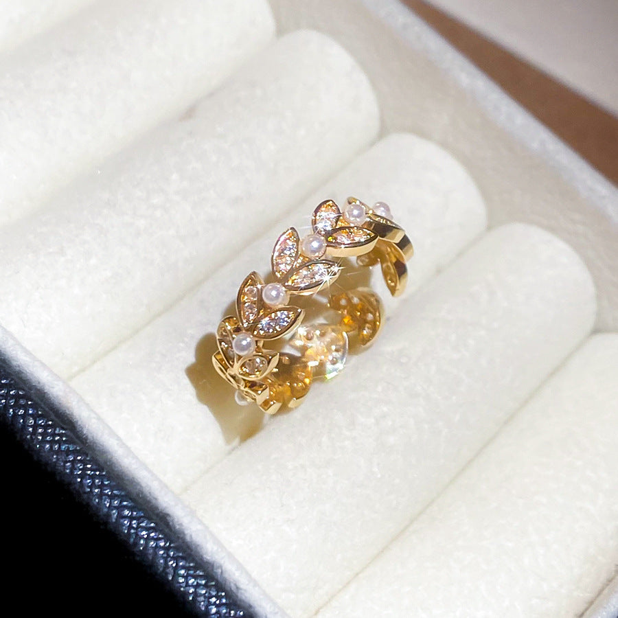 Anillo de lujo minimalista con perla en forma de espiga de trigo e incrustaciones de circonita para mujer