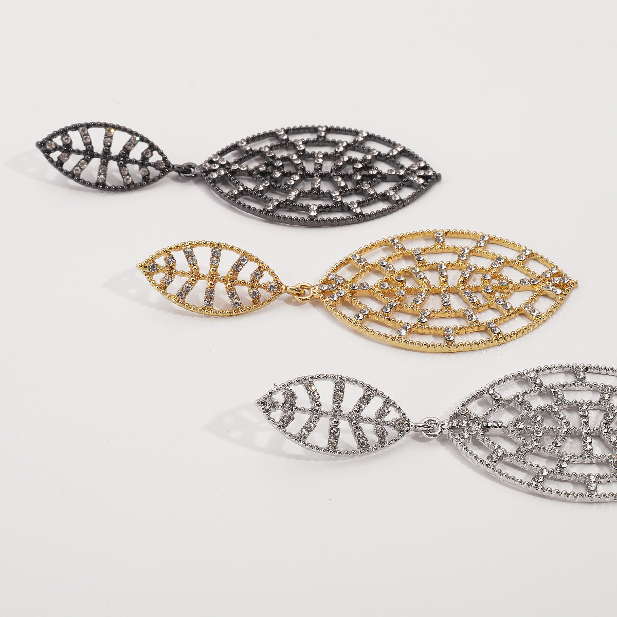 Elegant Leaf-Shaped Alloy Earrings with Rhinestone Inlay, Electroplated Finish, Geometric Design, Fashionable Women's Lightweight Luxury Ear Jewelry