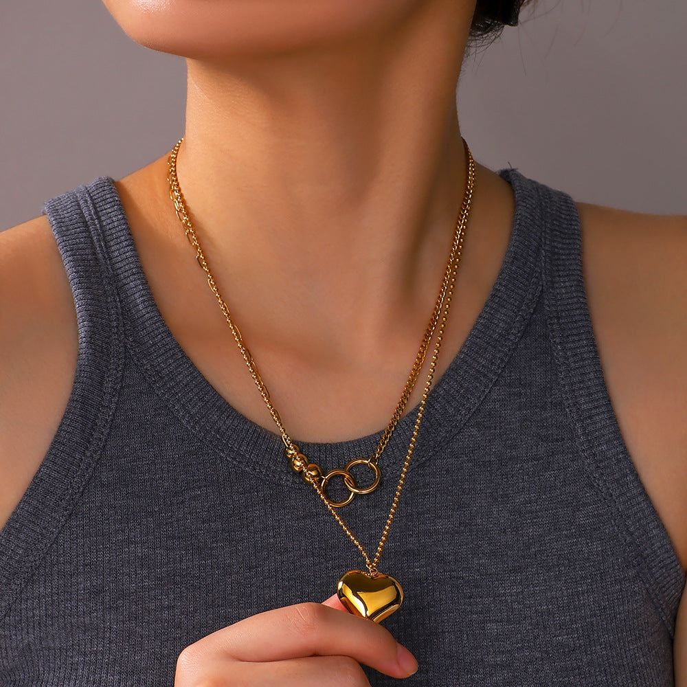 Collana con Pendente a Cuore Minimalista in Acciaio al Titanio con Placcatura in Oro 18K su Catena in Acciaio Inossidabile da Donna