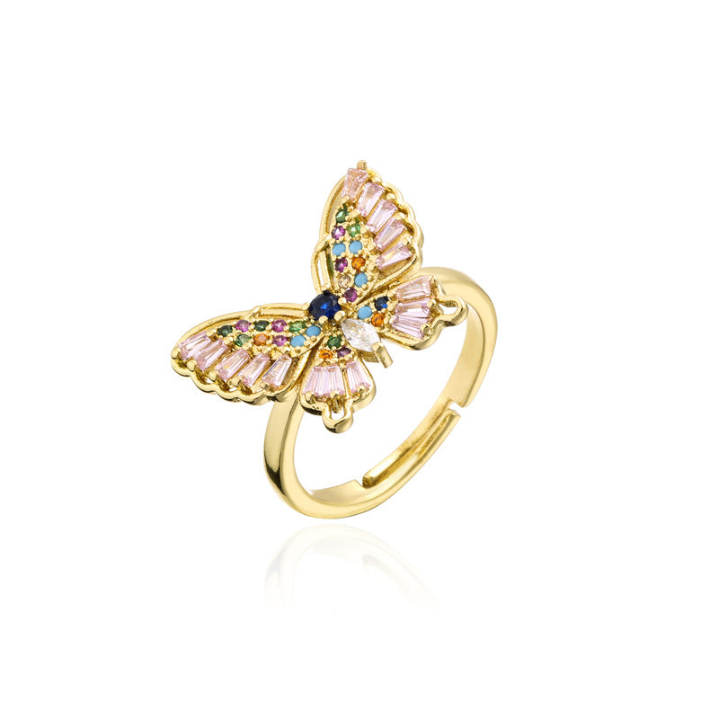 INS Style Geometric Butterfly Ring in Copper with Micro-Paved Cubic Zirconia and 18K Gold Plating