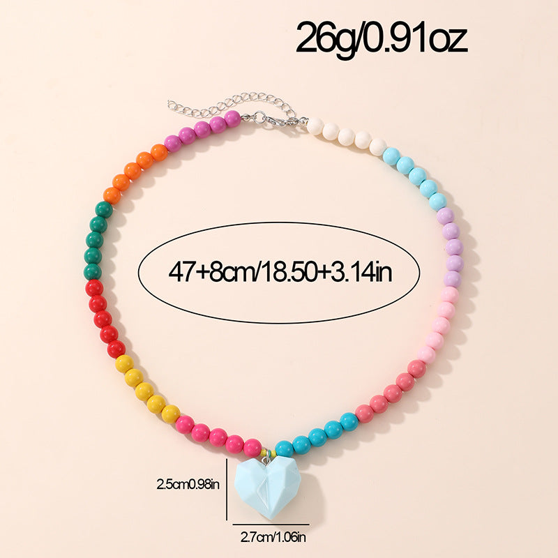 Lindo Collar de Resina con Forma de Lazo para Niñas con Acabado Pintado en Diseño Multicolor, Joyería Infantil Dulce y Juguetona