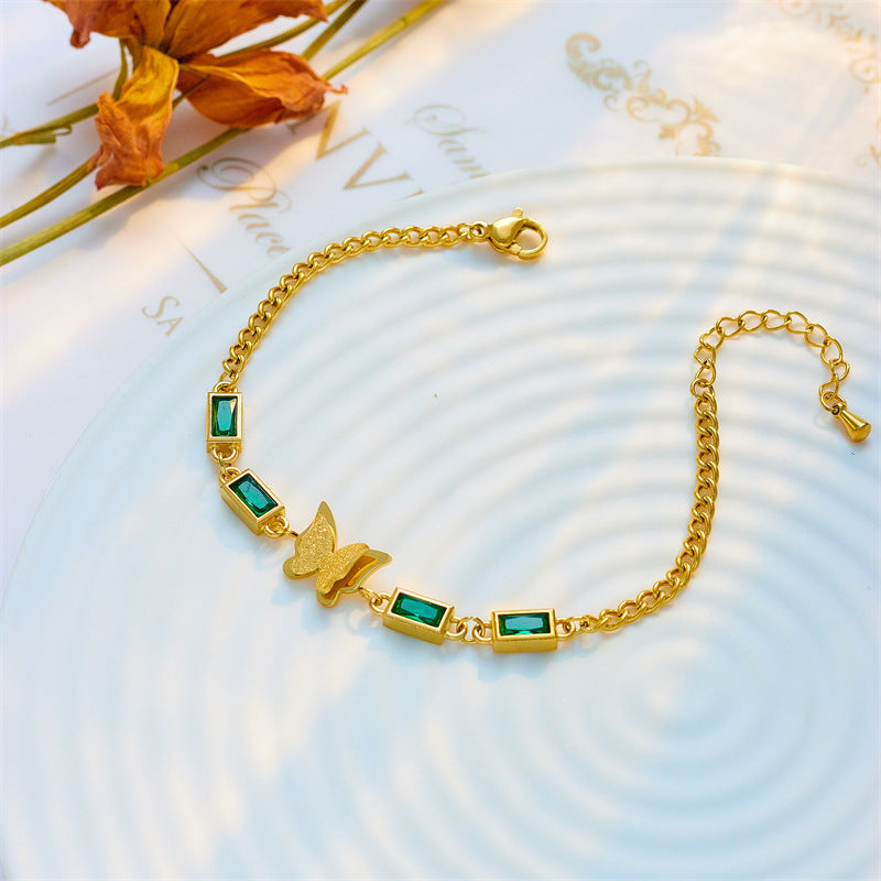Bracciale vintage minimalista da donna in acciaio al titanio con farfalla quadrata e strass verdi