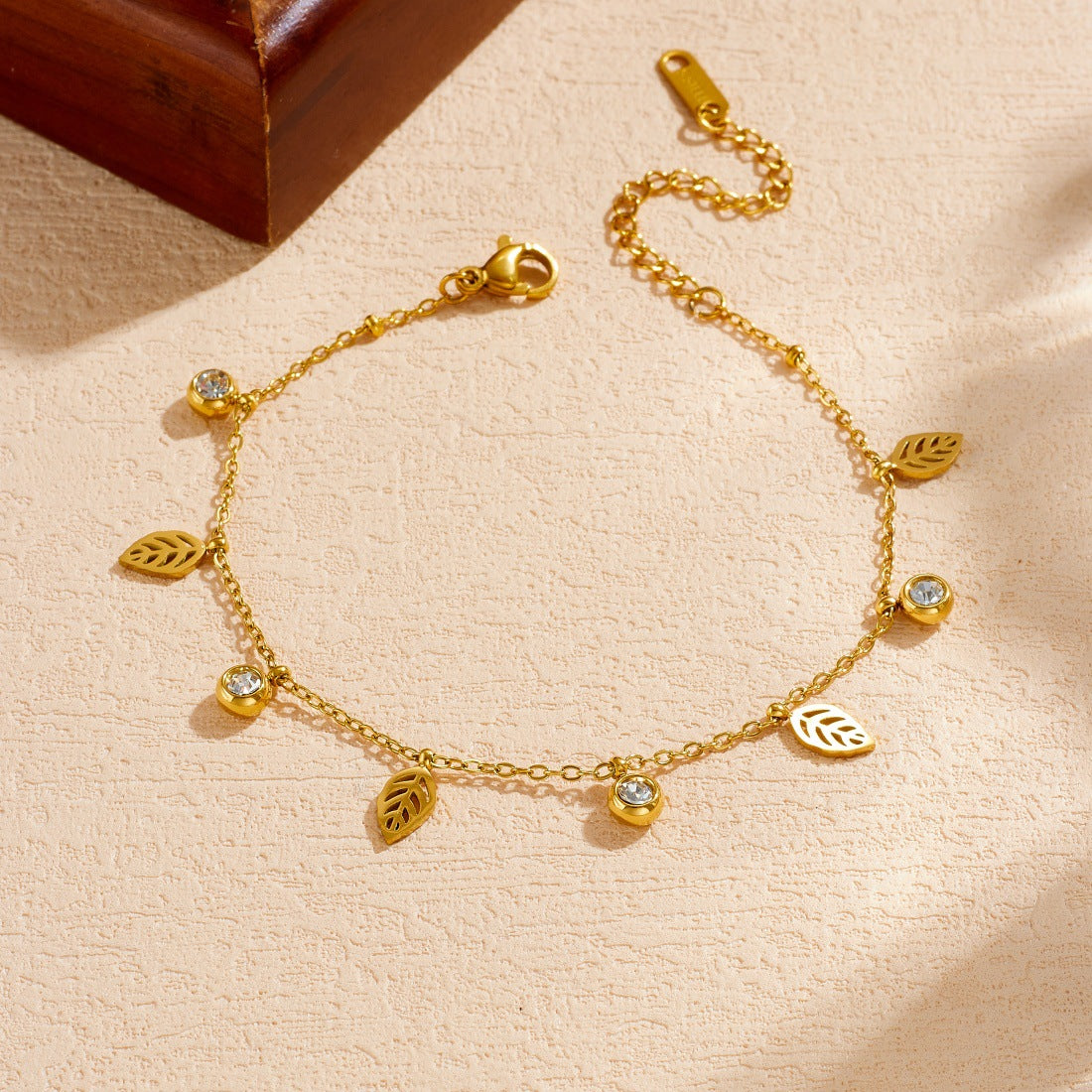Minimalist Gold Plated Stainless Steel Leaf Pendant with Rhinestone Inlay for Women