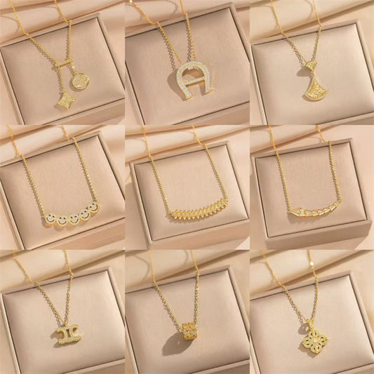 Collana pendente da donna minimalista a onda e geometrica in acciaio al titanio con placcatura in oro 18 carati, catena ipoallergenica con motivi a cuore e fiocco