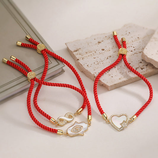 Light Luxury Fashion 18K Gold Plated Brass Heart Hand Micro-inlay Cubic Zirconia Shell Red Rope Bracelet for Women