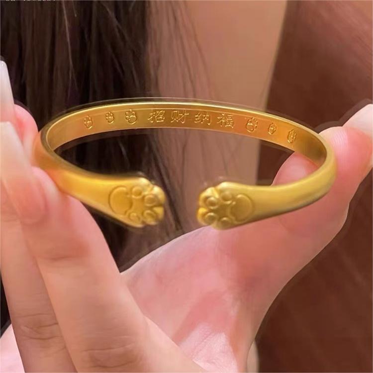 Bracciale a forma di zampa di gatto carino in rame placcato oro per donna con design delicato ed elegante