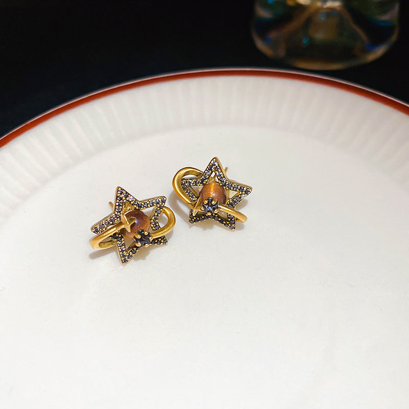 Pendientes de botón con diseño geométrico en forma de Saturno chapados en oro de estilo lujoso para mujer con incrustaciones de circonita y diseño minimalista elegante