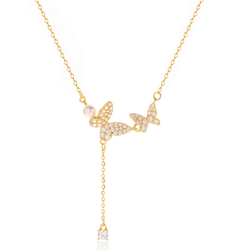 Elegante collana a farfalla in argento sterling 925 con zirconi cubici e nappe di perle a catena forzata da donna