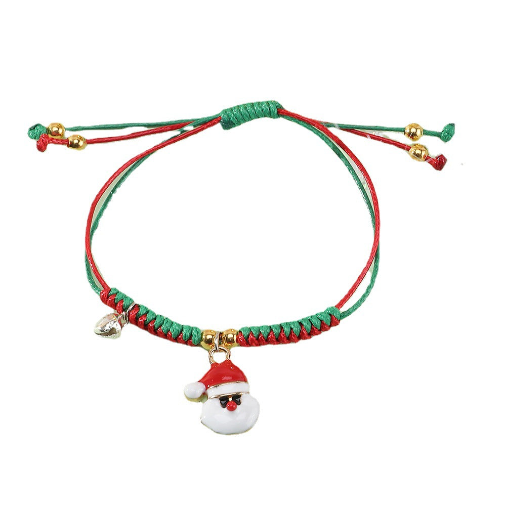 Bracciale Natalizio Artigianale Regolabile da Bambina con Ciondolo Babbo Natale in Cordino di Poliestere Rosso e Verde, Gioiello Festivo
