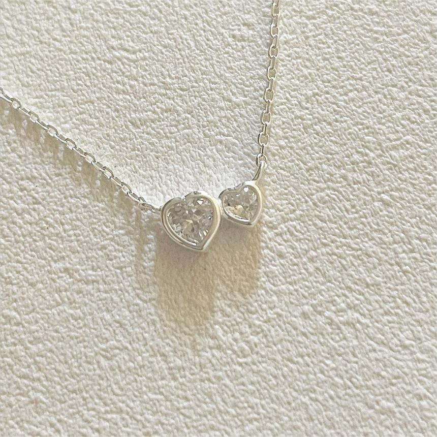 Collana Minimalista a Cuore in Argento Sterling 925 con Accenti di Zirconi su Catena a Croce per Donna