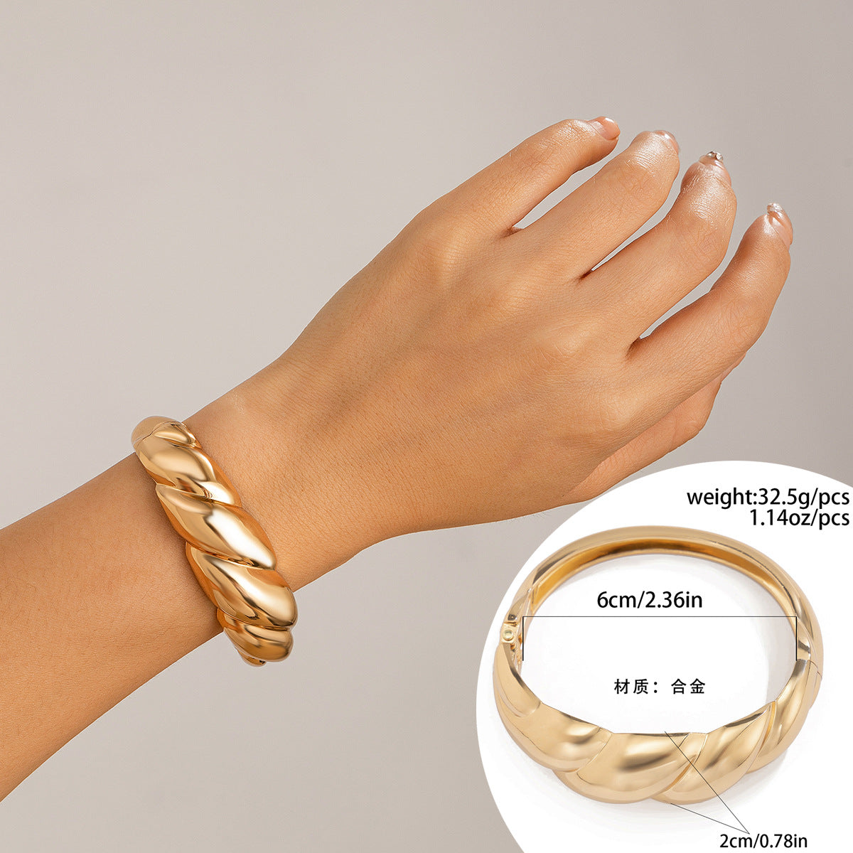 Bracciale a manetta in metallo lucidato a forma di goccia d'acqua oversize con finitura a specchio e design geometrico