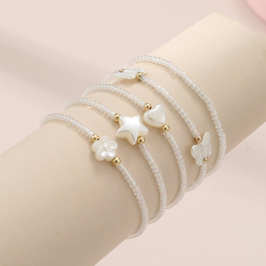 Set di braccialetti con perline a forma di stella, cuore, fiore e farfalla in stile coreano per bambine, gioielli da mano a tema principessa
