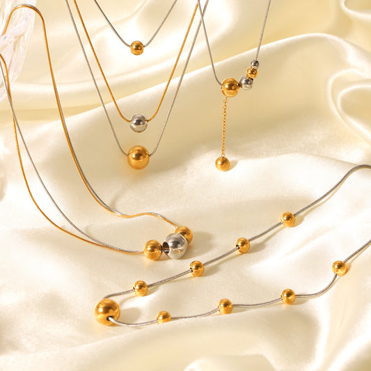 Collar minimalista geométrico con colgante de cuentas redondas para mujer, de acero inoxidable con dije de acero titanio y cadena de serpiente chapada en oro