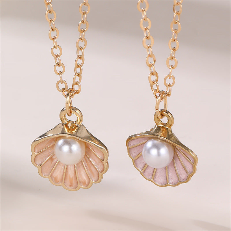 Dulce Collar con Colgante de Mariposa y Lazo Fresco para Niñas con Dije de Concha con Perlas de Aleación y Acabado Esmaltado Artesanal