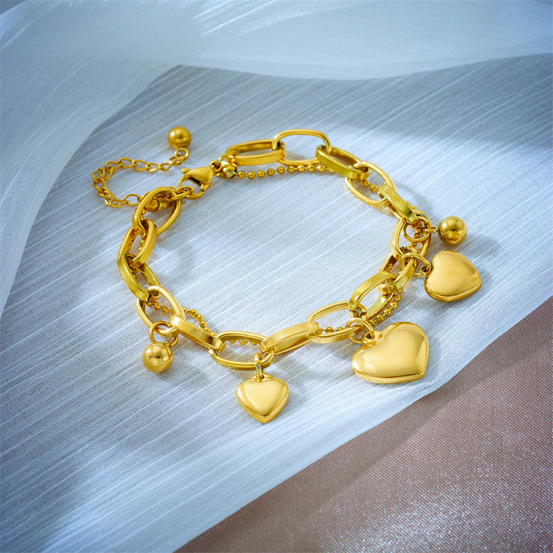 Bracciale vintage a cuore placcato in acciaio al titanio con design a catena multistrato da donna