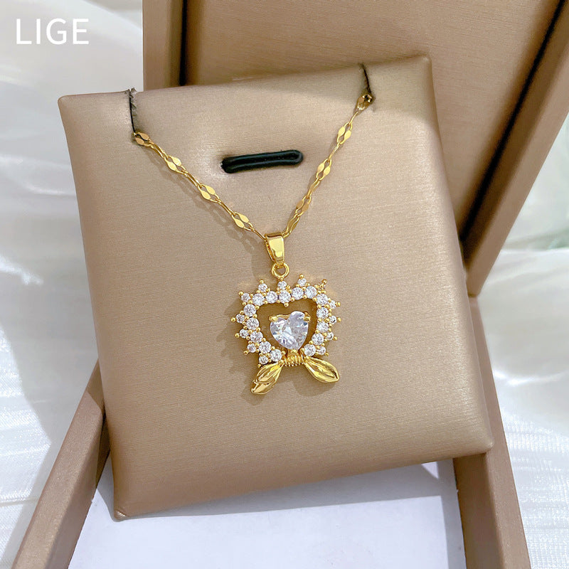 Elegante Collar con Colgante de Corazón y Lazo para Mujer Cadena de Acero Inoxidable con Acentos de Pedrería Diseño Geométrico Minimalista