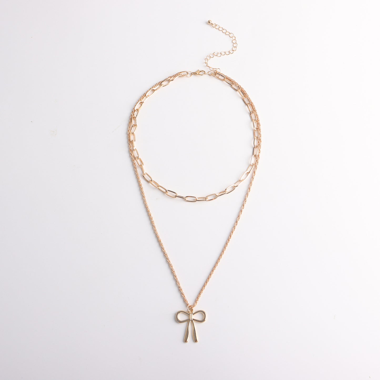 Punk Style Bow-Shaped Alloy Pendant Necklace with Plated Finish and Double-Layer Cross Chain