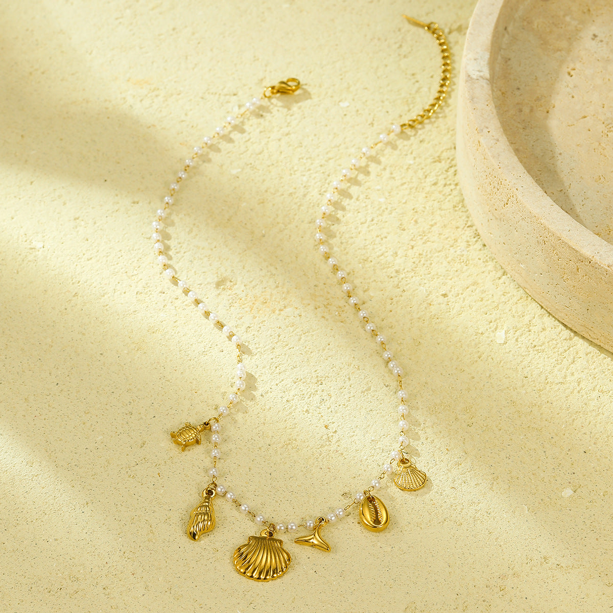 Ocean-Themed Pearl-Embellished Titanium Steel Pendant Necklace with Starfish and Seashell Motifs, Fashionable Minimalist Design for Women