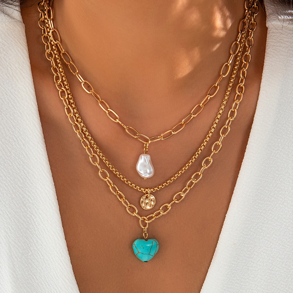Collar con colgante de aleación con forma de corazón, de estilo barroco étnico, con acabado chapado y detalle de turquesa para mujer