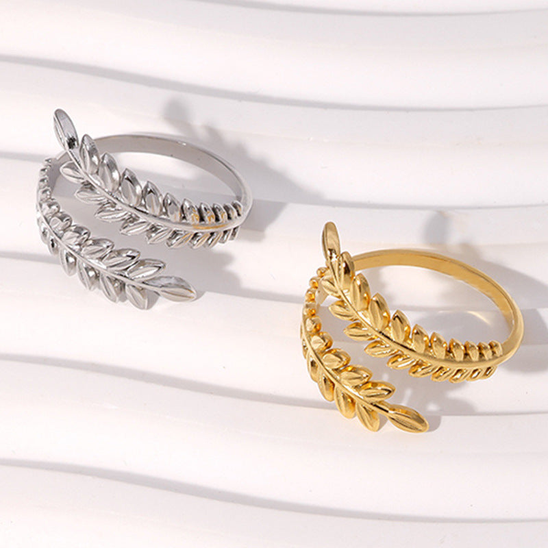 Anello da donna regolabile a forma di foglia in acciaio al titanio con finitura placcata, stile minimalista