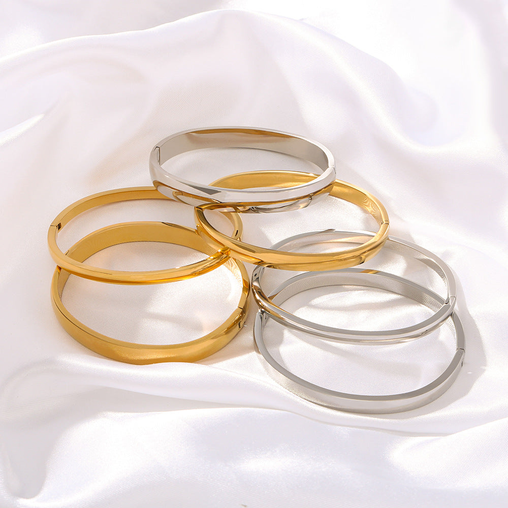 Bracciale Minimalista in Acciaio al Titanio con Finitura Liscia Placcata Sottovuoto, Design Rotondo e Sferico